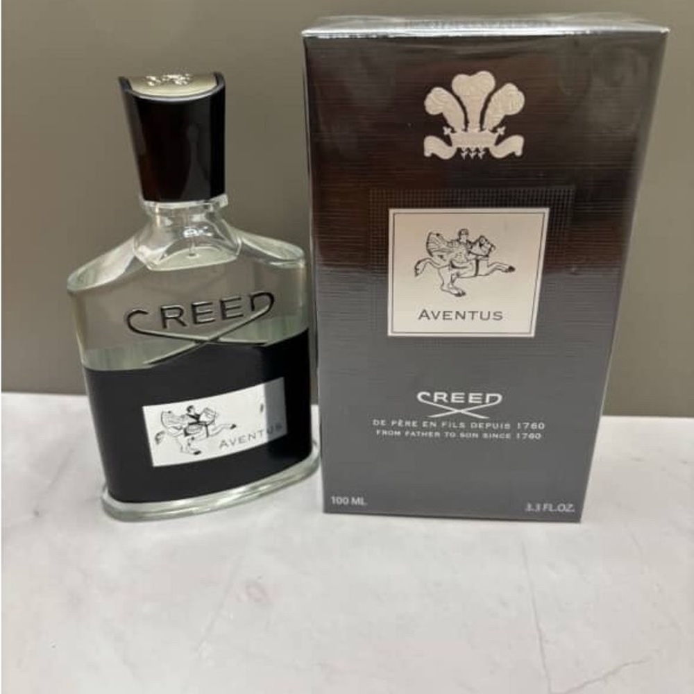 Creed Aventus Fragrance with Black and Silver Accents